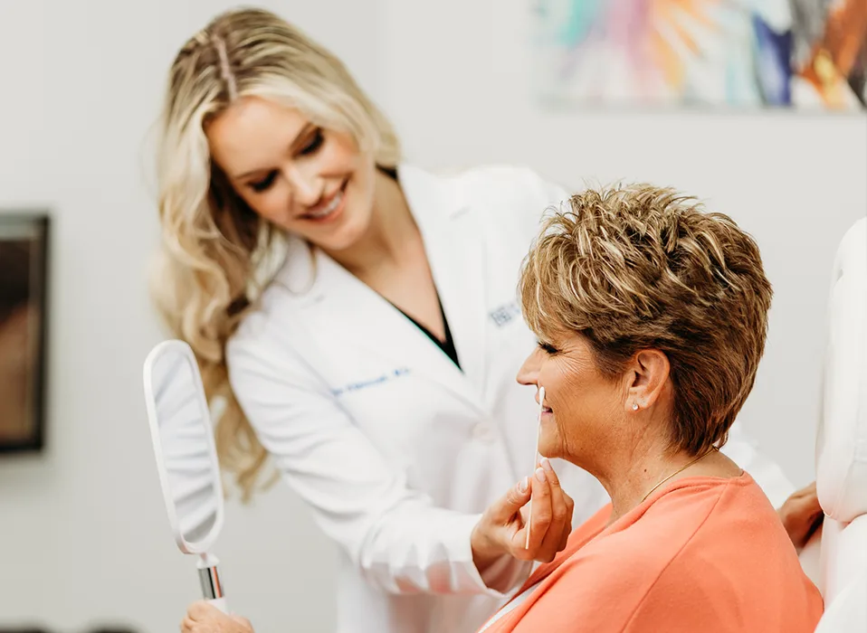 Dr. Jaclyn A. Klimczak inspect patient